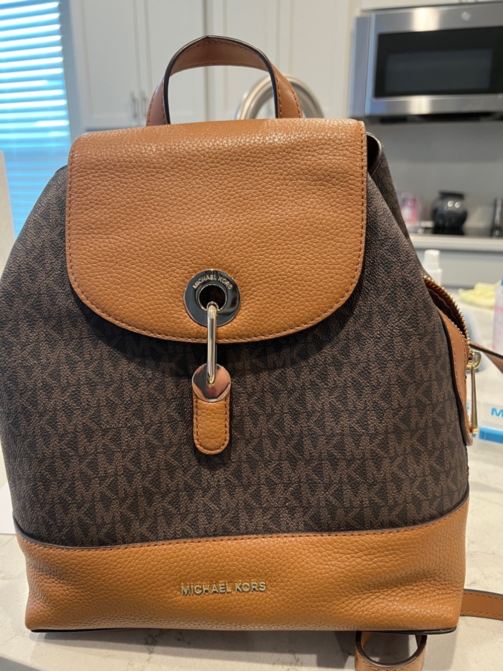 Michael Kors Brown & Tan MK Logo Leather-Trim Backpack. This was gift